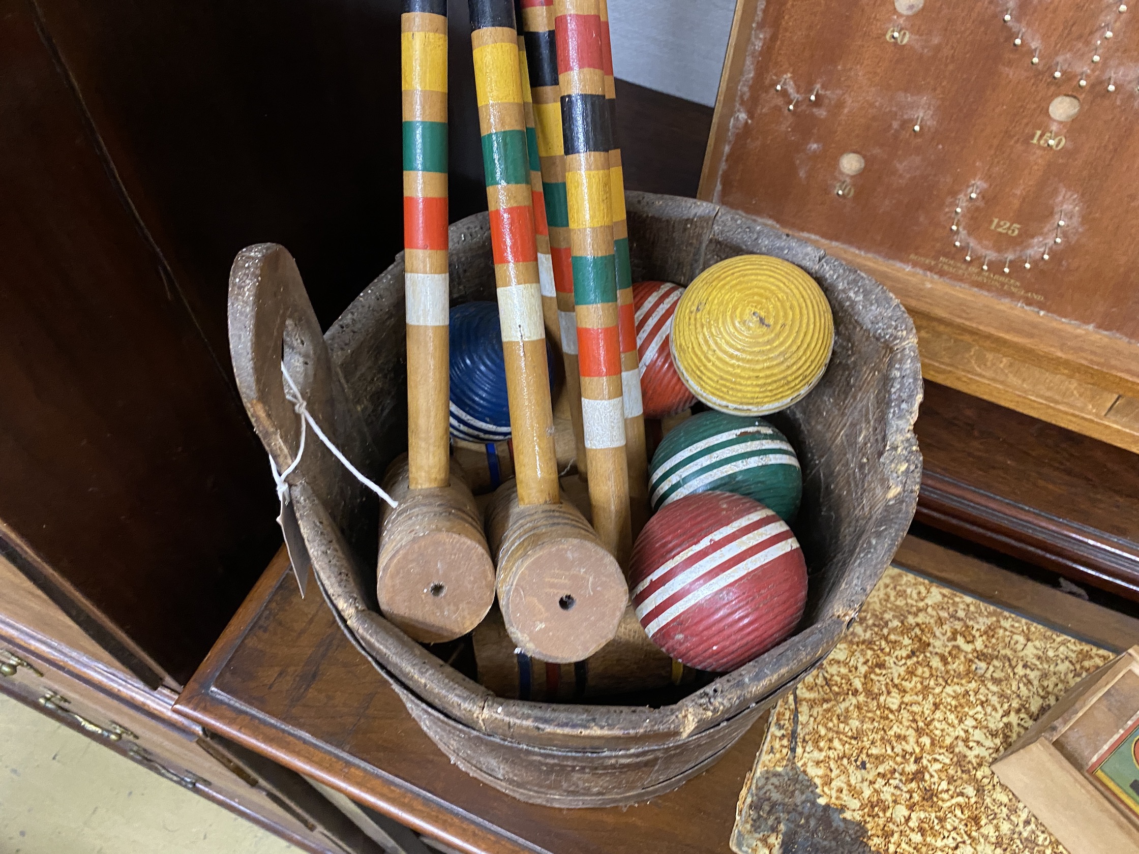 A child's croquet set and assorted games etc.